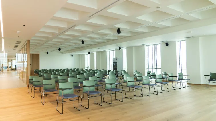 Training space with rows of seating and natural daylight